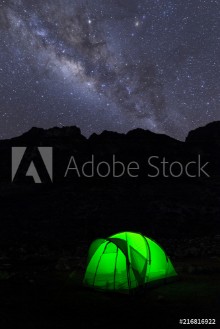 Bild på Scenic view of tent under milky way at night